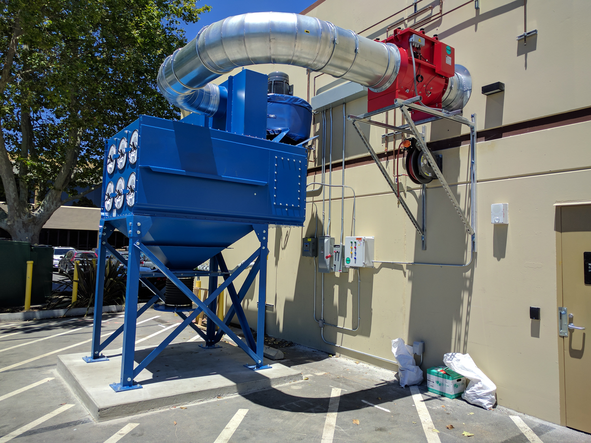 Industrial dust filtration unit used with Big Bag Filling Systems for clean and safe powder handling